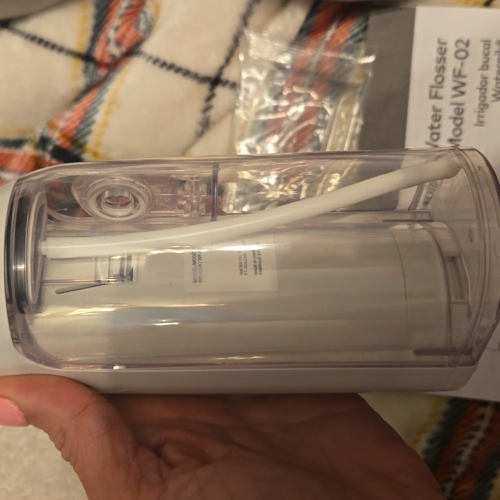 New Waterpik Water Flosser & 2 Crest Toothpaste Bundle - Picture 2 of 3